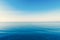 Blue sea with waves and sky with clouds.Calm tranquil blue sea relaxing background with copy space