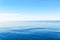 Blue sea with waves and sky with clouds.Calm tranquil blue sea relaxing background with copy space