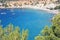 The blue sea of â€‹â€‹ibiza in summer and its bright colors between water and beaches in the coves