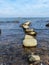 Blue seascape with many stones on a sunny day