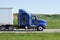 Blue Semi Truck On Interstate Highway