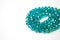 Blue Shinny Crystal Beads Glass Isoalted on White Background Copy space Hobby Handmade Fashion Beauty