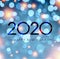 Blue shiny Happy New Year 2020 poster with bokeh background.