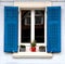 Blue Shutters and Red Pot