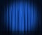 Blue silk curtains for theater and cinema spotlit