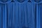 Blue silk stage curtain on theater