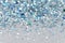 Blue and Silver Frozen Snow Winter Sparkling Stars Glitter background. Holiday, Christmas, New Year abstract texture