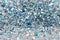 Blue and Silver Frozen Snow Winter Sparkling Stars Glitter background. Holiday, Christmas, New Year abstract texture