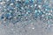 Blue and Silver Frozen Snow Winter Sparkling Stars Glitter background. Holiday, Christmas, New Year abstract texture