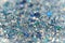 Blue and Silver Frozen Snow Winter Sparkling Stars Glitter background. Holiday, Christmas, New Year abstract texture