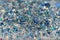 Blue and Silver Frozen Snow Winter Sparkling Stars Glitter background. Holiday, Christmas, New Year abstract texture