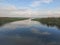 Blue Skies reflecting on the lake below.