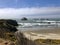 Blue skies and white clouds over looking the ocean and beach