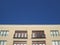 Blue Sky Above Apartment Balconies