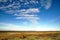 Blue sky and altocumulus clouds over Morecambe Bay