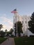 Blue sky American flag holy place of worship beautiful view