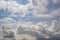 Blue sky background with big white tiny stratus cirrus striped clouds