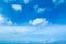 Blue sky background with tiny clouds. fluffy clouds in the sky. summer sky