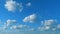 Blue Sky Background With Tiny Clouds. Low Angle View. Blue Clear Sky And White Clouds. Timelapse.