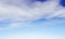 Blue sky background with a tiny clouds. Sunshine clouds sky during morning background. Abstract blurred cyan gradient of peaceful