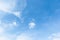 Blue sky background with white clouds cumulus floating soft focus