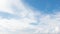 Blue sky background with white clouds cumulus floating soft focus