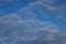 Blue sky background with white and gray clouds. Beautiful image of a huge sky and clouds. soft focus