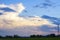 Blue sky and beautiful cloud with meadow tree.