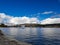 Blue sky big cloud shore zurich lake sunny day good weather wak along the shore of zurich lake with fountain the middle