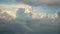 Blue sky and big white clouds, Wide Footage from the plane porthole.