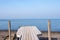 Blue Sky Blue Sea and an Old Rickety Slanted Jetty on a Stoney Beach in Largs on the West Coast of Scotland