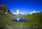 Blue sky, clear view of Matterhorn reflection in summer lake