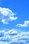 Blue sky and cloud as background texture in vertical frame