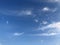 Blue sky with cloud closeup background sky and sun Lens flare on Clear on Real blue sky background wide screen for banner