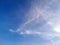 Blue sky with clouds, circus clouds on the blue sky, background, copy space for text