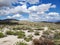 Blue sky and clouds over desert hills at the Grapevine Canyon Petroglpyh Site outside of Laughlin, Nevada