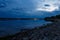 Blue sky with clouds and river at dusk