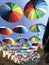 Of the blue sky depicts a variety of colored umbrellas