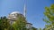 Blue sky domes and minarets, mosques in turkey, trees and minaret of a mosque