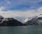 Blue sky and fluffy clouds over Alaska coastline