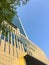 Blue sky and golden yellow commercial office building