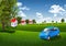 Blue sky, green grass and houses