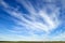 Blue sky, light clouds, Earth horizon panorama