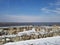 Blue sky light white clouds stone fortress castle Belgrade view donau forest trees winter snow sun over tourist place