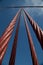 Blue sky and man-made engineering miracle. Steel cables of Golden Gate Bridge