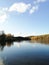 A blue sky mirrowed in the autumn water