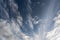 Blue sky with mixed clouds wide angle upward shot at summer daytime