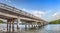 Blue sky over bridge over Hickory Pass leading to the ocean in Bonita Springs