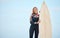 Blue sky, portrait and surfboard, surfer and woman ready to surf Costa Rica ocean waves on vacation and mockup. Fitness