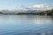 Blue sky reflected in Esthwaite Water in the Lake District